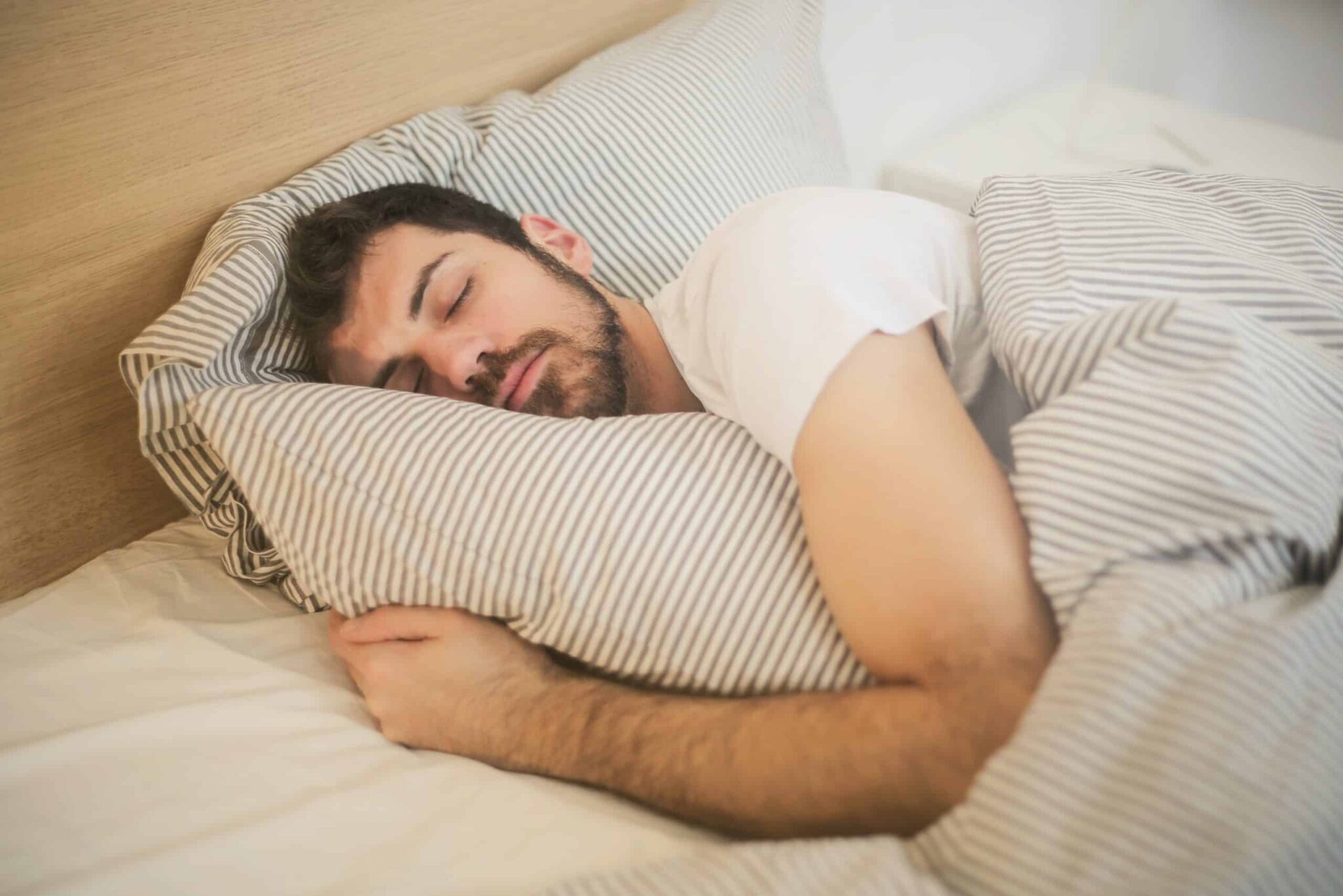 Young man sleeping comfortably.
