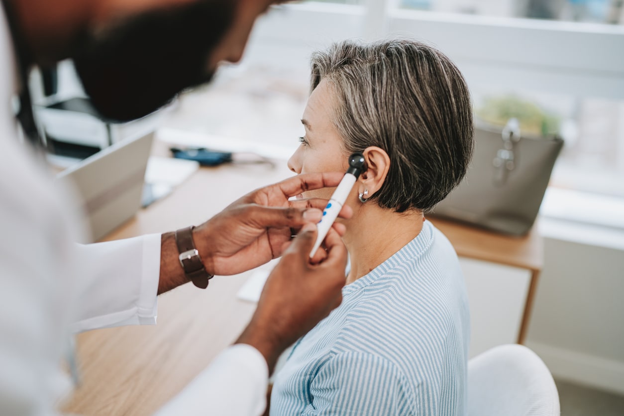Woman gets ear examined